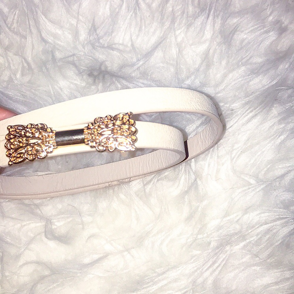 Tan belt with bow buckle